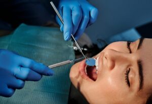 dentist working in mouth