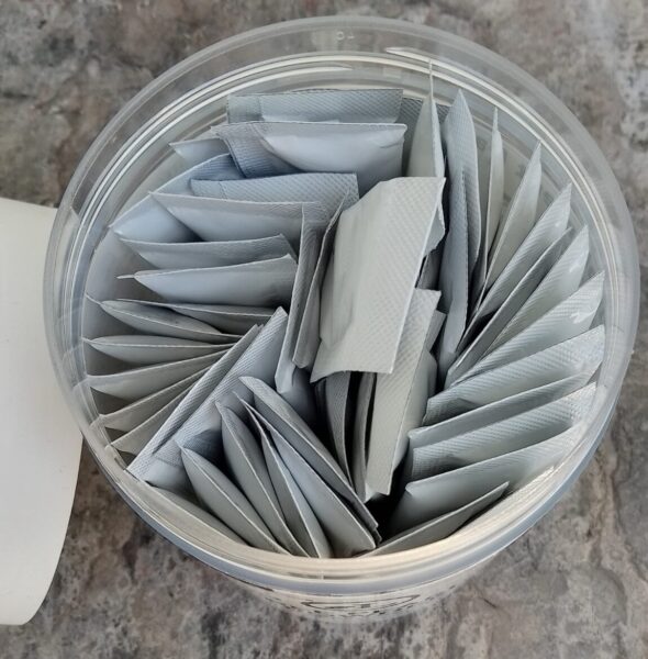 Demonstrates how individual sachets look and size